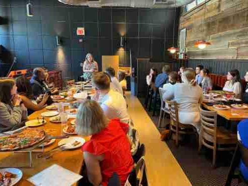 Alumni gather in a restaurant in Washington DC