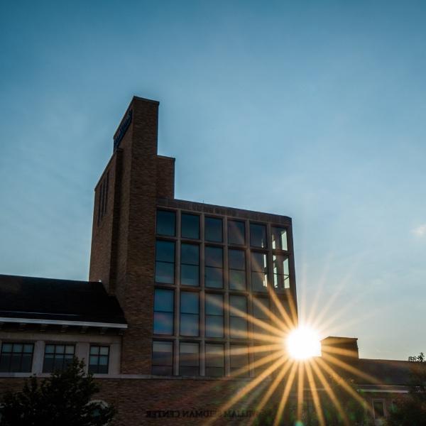 Sun shines through the Seidman College of Business building in downtown Grand Rapids